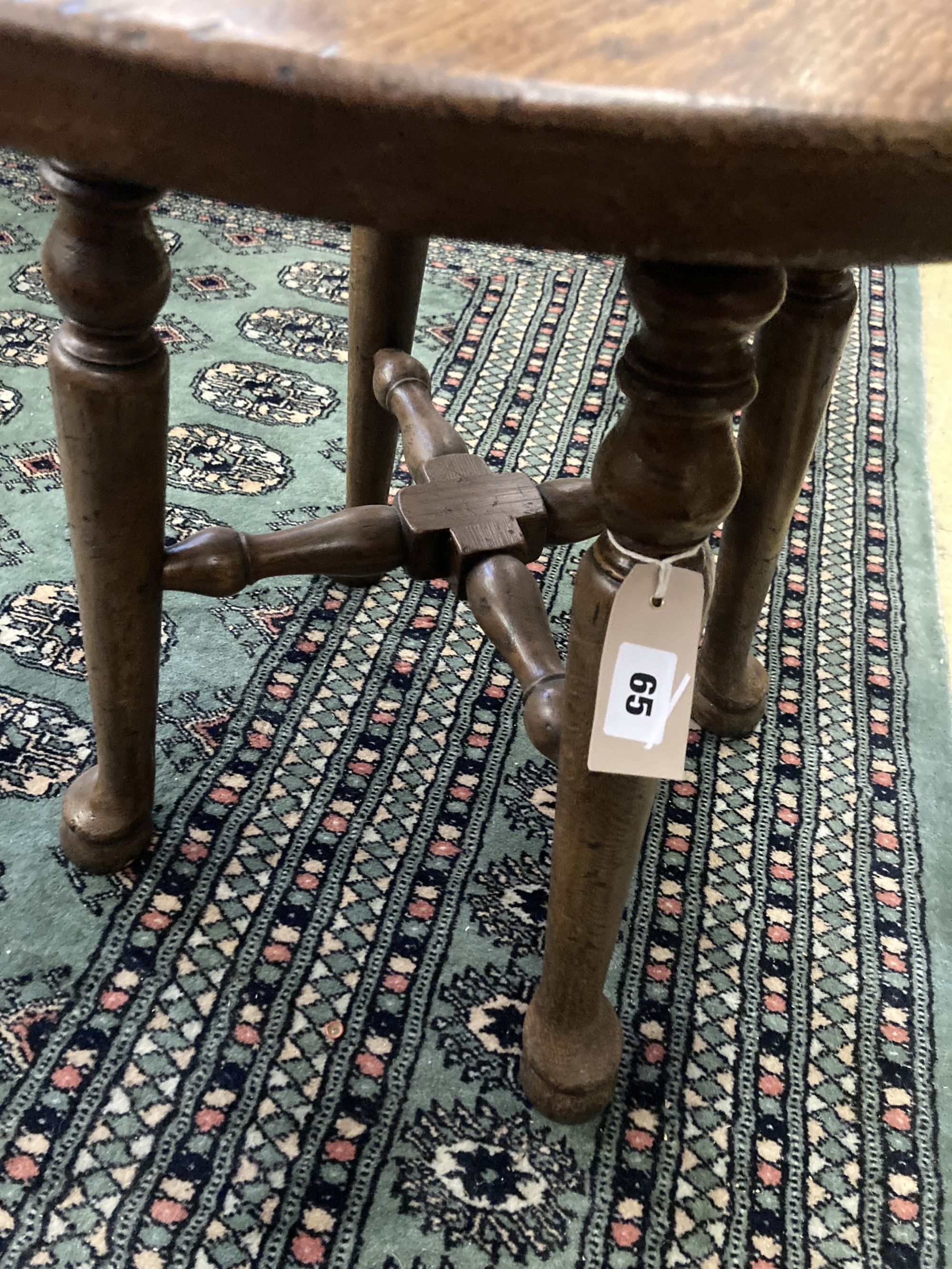An early 20th century circular oak occasional table, diameter 50cm height 53cm